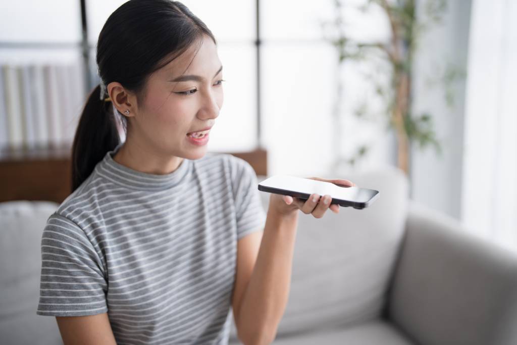 Woman talking to an AI voice bot